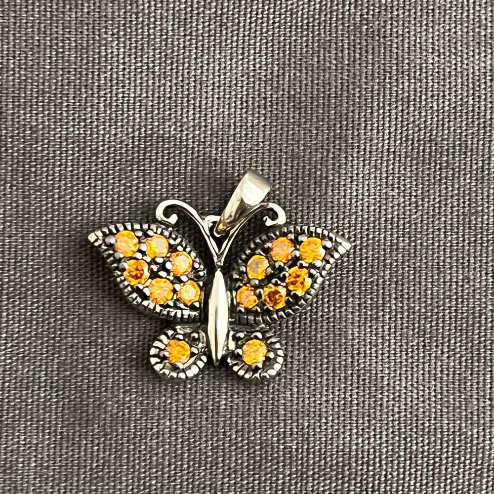 Vintage sterling silver butterfly pendant set with orange CZ stones. - Picture 2 of 4